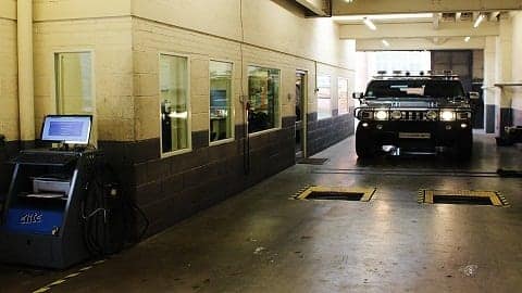The DVSA test lane, equipment and inspection window inside City Centre MOTs